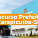 Prédio azul da Prefeitura de Carapicuíba com faixa laranja e texto sobre concurso público
