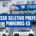 Prédio da Prefeitura de Pinheiros-ES com faixa azul de anúncio de processo seletivo
