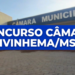 Fachada da Câmara Municipal de Ivinhema com texto "Concurso Câmara Ivinhema/MS" sobre faixa azul